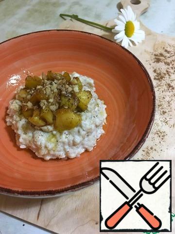 Put the porridge on a plate, add the caramelized apples, and sprinkle with crushed walnuts and cinnamon. Bon Appetit!
