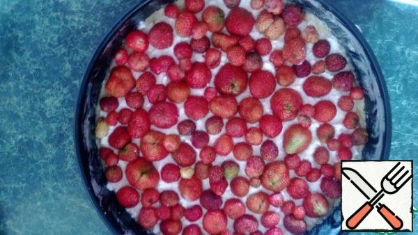 Spread the berries on top.