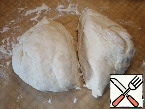 Divide the dough in half. And leave a small ball of dough for decoration.