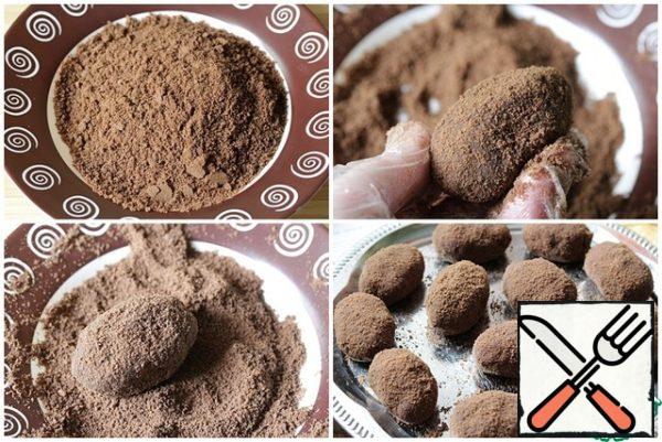 Form cakes and roll them in crushed chocolate cookies or cocoa powder.
Put it in the refrigerator overnight.