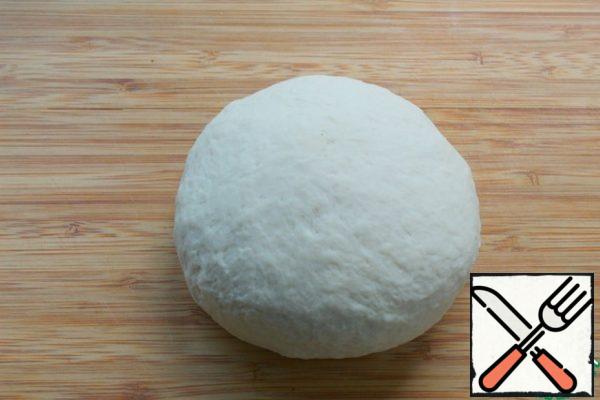 Knead the soft dough, cover and leave in the heat for 30 minutes.