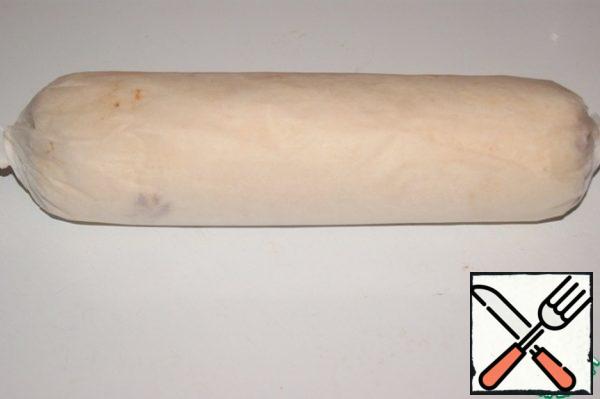 Put the cream on a biscuit and roll it into paper, like a candy. Put it in the refrigerator for a couple of hours.