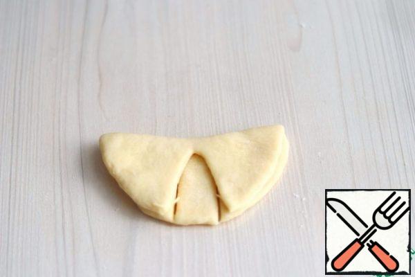Then fold the blank in half.