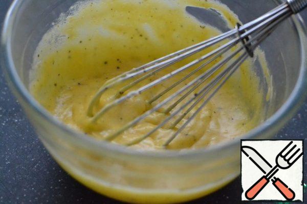 Mix the oil at room temperature with salt, pepper and yolks. Finely chop the parsley.