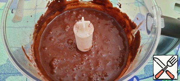 Add cocoa, powdered sugar, baking powder, soda and yogurt, and mix.