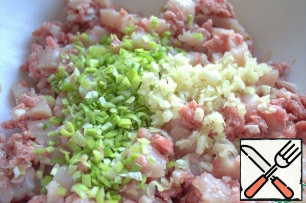 Add the onion (I have leeks) and squeezed garlic if desired.