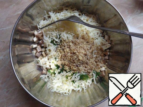 walnuts and salt crushed in a mortar. Stir.