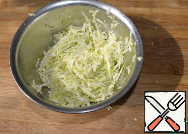 Put the zucchini on a medium grater, salt, mix, and leave for 10 minutes. Slightly (without fanaticism) squeeze out the excess liquid.