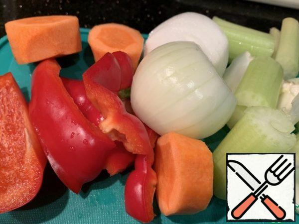 Add the coarsely chopped onion, carrot, celery and bell pepper.
