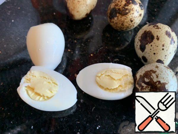 Cook the quail eggs.