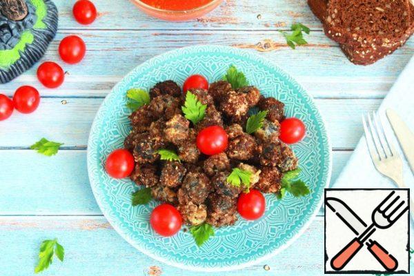 Ready fried olives with sauce are served to the table. They are very delicious both hot and cold.