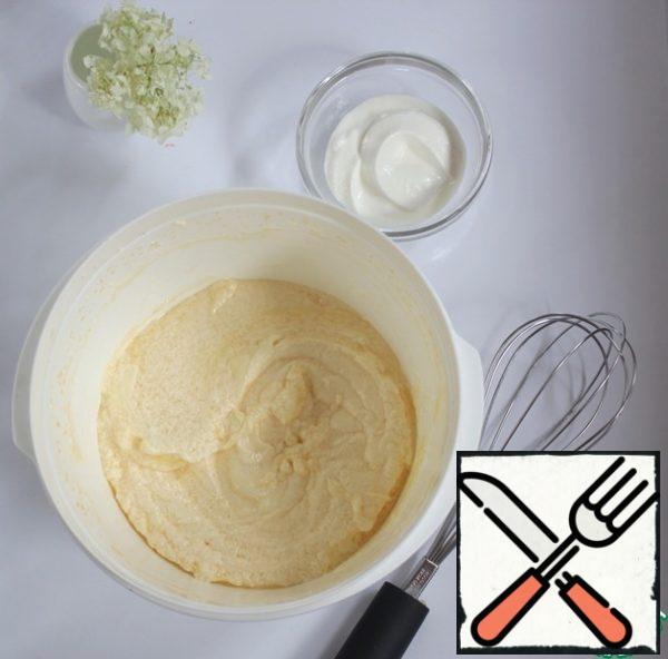 Add two eggs one at a time, beat, add sour cream, continue to beat.