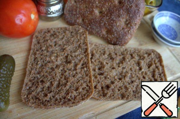 I love the combination of cheese with this pure rye coarse bread. Loaves are sold already cut lengthwise.