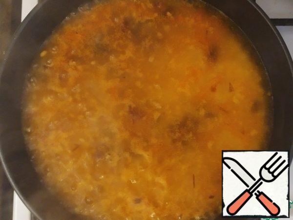 Add water, salt, and mix. Turn down the heat to medium.