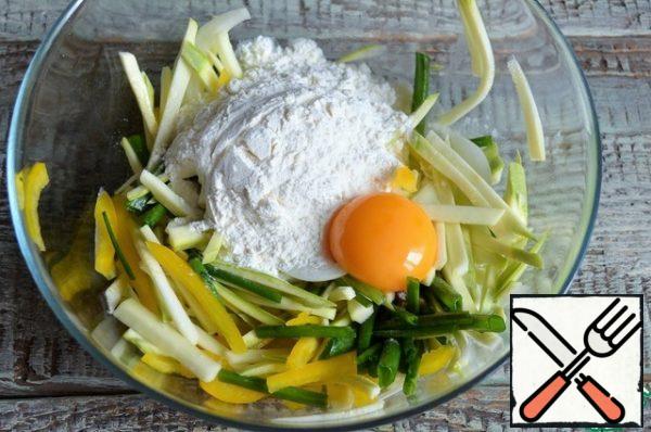 Add flour and starch, yolk.