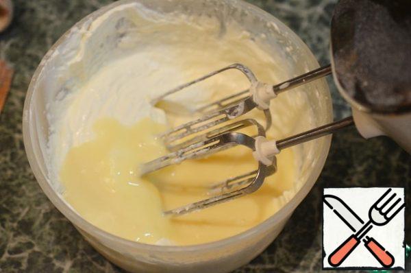Add the condensed milk and whisk again. Adjust the amount to your liking. In my version of the proportions, the ice cream is not too sweet.