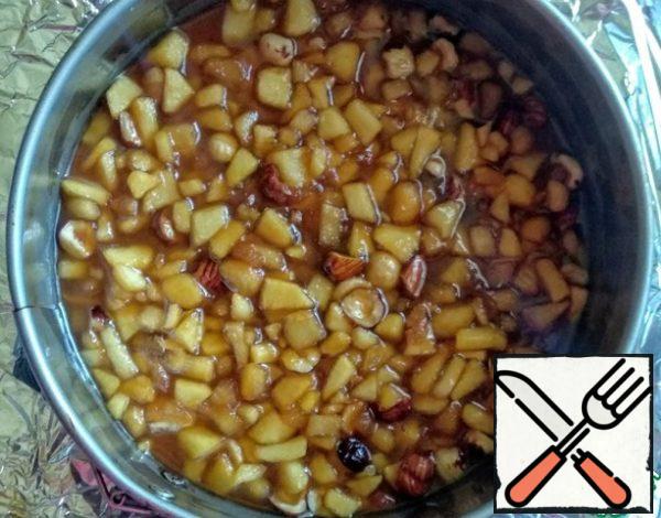 Form for baking (I have 20 cm.) if necessary, cover with foil or parchment, grease the sides with vegetable oil (1 tsp.). Transfer the caramel to the form.