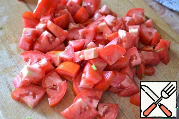 Slice the tomatoes.
