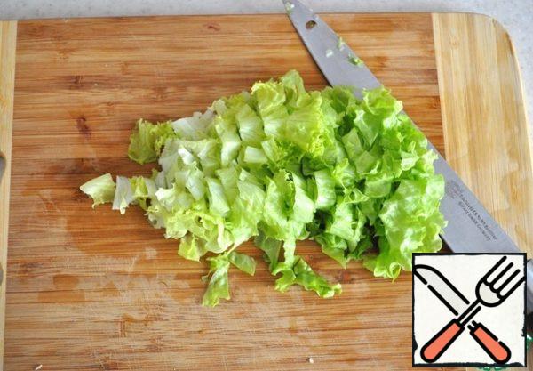 Chop the salad.