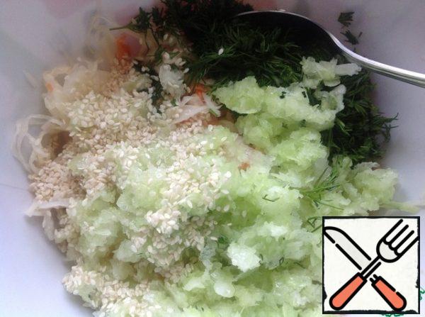 Add oil and sesame seeds.  Stir the salad thoroughly.