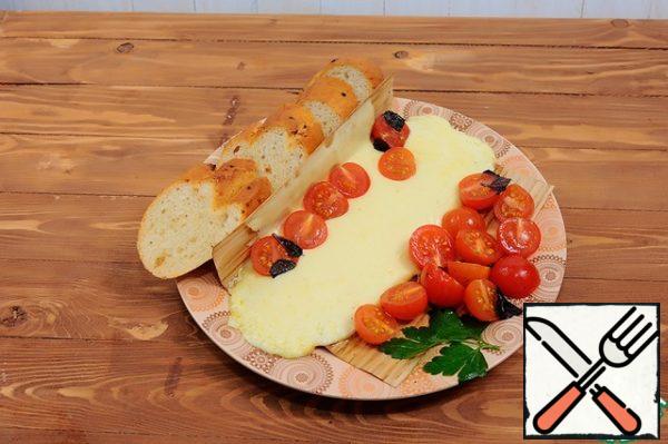 7. Transfer the rolls to a serving platter.  Remove the foil and unfold.  Spread the tomato mixture on top and invite guests.