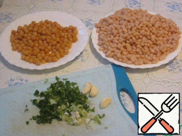 Bean and Chickpeas should be filled with water for at least 4 hours, preferably overnight.
Drain the water.  Then pour fresh water and cook until tender, adding salt at the end (beans are cooked for about an hour and a little, chickpeas for about 1.5 hours).  I soak and cook separately.
Save the water in which the beans and chickpeas were cooked.