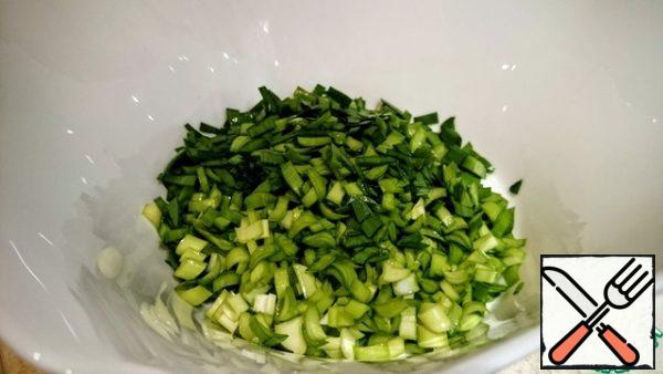 Meanwhile, the onion is finely chopped.  In summer I use only fresh green onions, in winter I use onions for this salad.