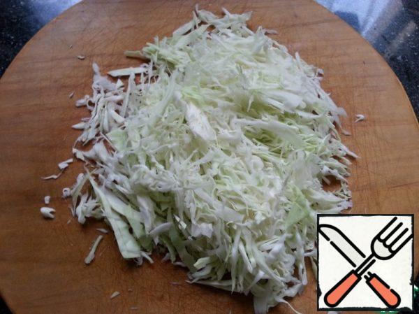 Chop the cabbage thinly.  Lightly wrinkle with hands without salt.