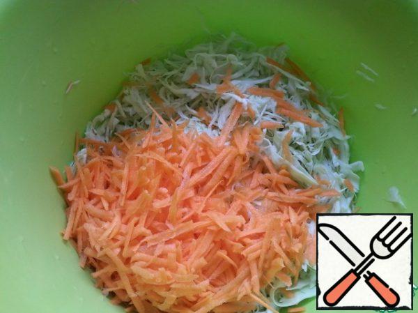 Grate the carrots.