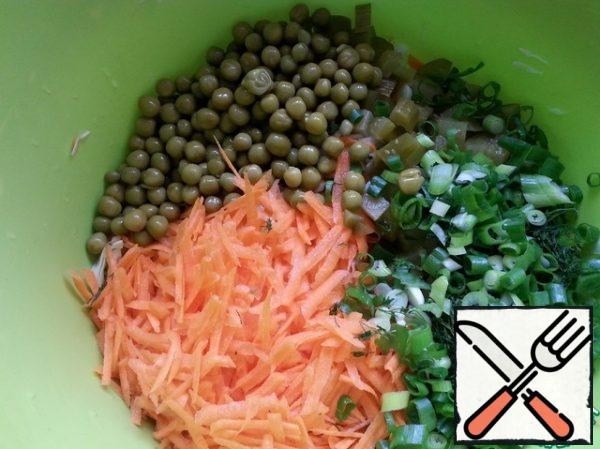 Add greens and peas to cabbage and carrots.