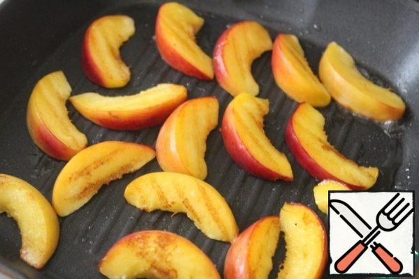 Fry the peaches on both sides in olive oil in a grill pan.