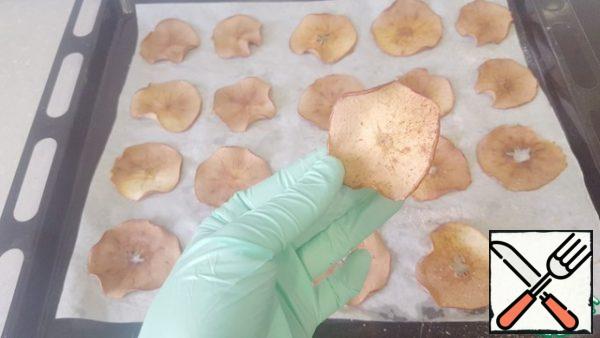 Ready-made chips should be completely dry and brittle. Carefully remove from the parchment. Store in an airtight container at room temperature .