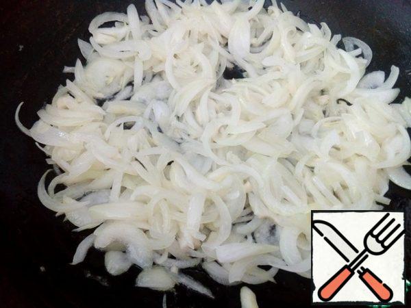 Heat vegetable oil and butter in a pan, add onion and garlic, stirring occasionally, simmer for a couple of minutes.