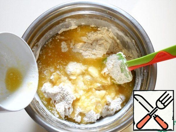Add the second half of the flour, combine, pour the melted butter at room temperature (or slightly heat it).
Knead the dough well in a bowl.