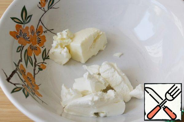 Put the butter and cream cheese in a deep bowl. They must be at room temperature.