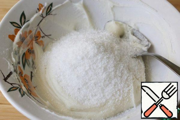 Add the coconut shavings and mix well.
You may need more shavings, as a result, you should get a thick mass from which you can form candy. I made these candies twice and indicate the amount that took me.