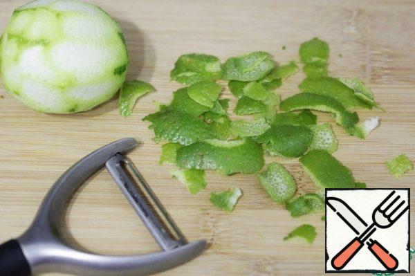 Cut the zest from the lime using a peeler.