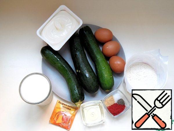 We will prepare the necessary products. Wash the zucchini, clean the stalk, if there is damage on the surface - remove, do not remove the skin. Prepare all the spices, curd cheese should be at room temperature, sift the flour.