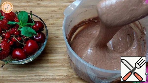 Mix the whites with the yolks, add flour and cocoa.