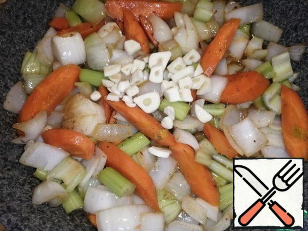 Add the coarsely chopped garlic and fry for one minute.