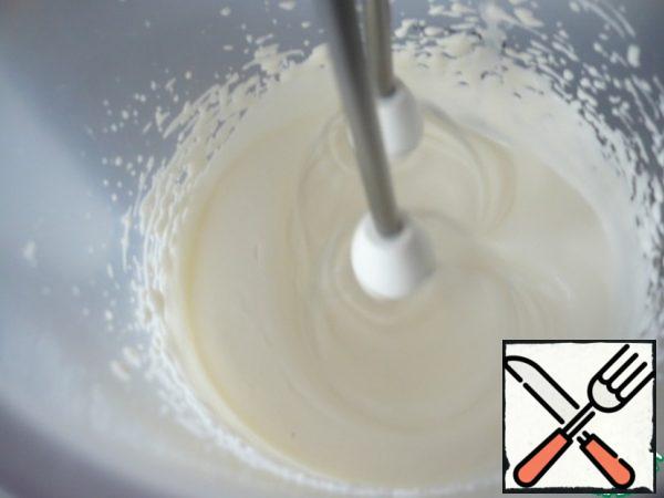 Then add the condensed milk to the cold cream and beat with a mixer until thick peaks form.