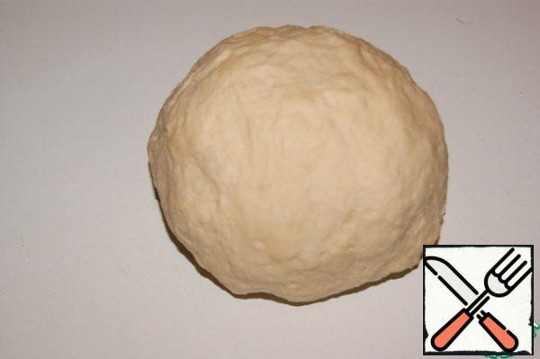 Knead well without adding flour. Yeast dough likes to be touched. Knead it for at least 10 minutes, so the yeast will activate and the dough will rise faster.
Roll it into a ball.