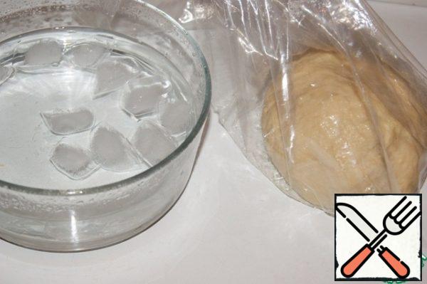 Pour ice water into a free container and add ice cubes to it.
Put the dough in a food bag and...