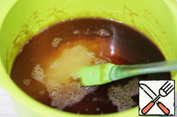 Pour in the espresso and orange juice.