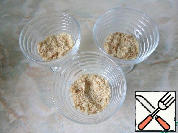 Put the cookie crumbs in the vases.