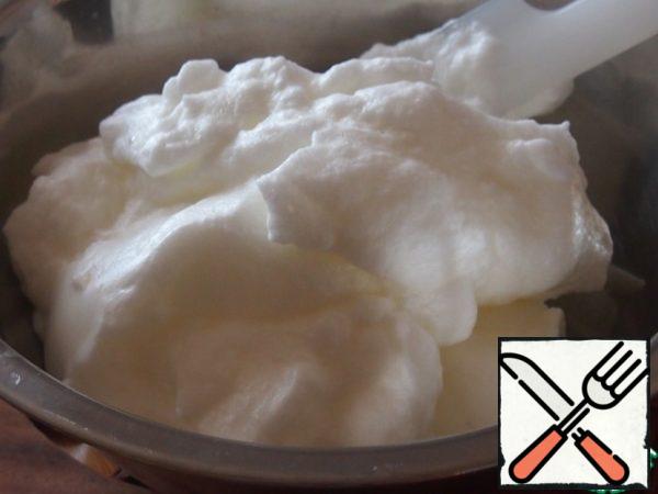 Beat the whites to soft peaks, then add the rest of the sugar and beat to tight peaks.