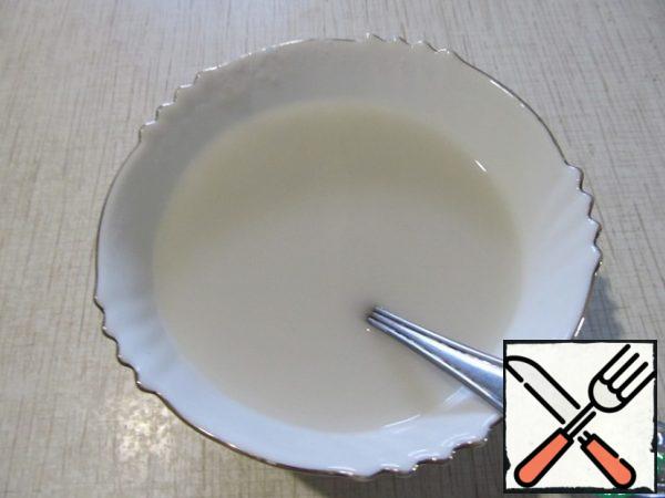 Starch is diluted in a small amount of cold water.