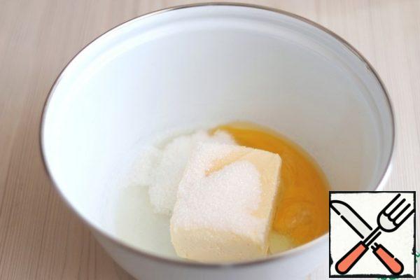 In a bowl, add 150 gr. of soft butter, add 3 tablespoons of sugar, add 1 packet of baking powder, salt (1 sliver), egg (1 PC.)
