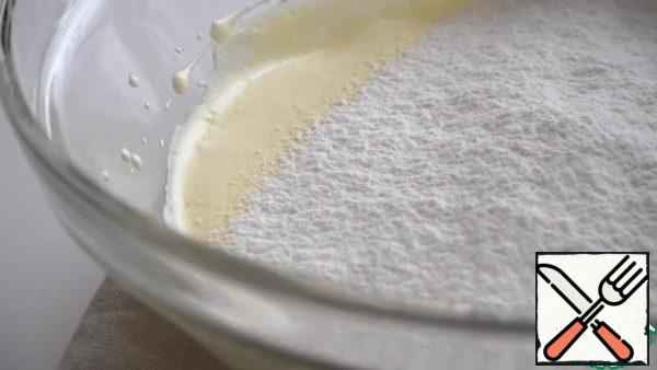Sift the flour and starch into a bowl.
