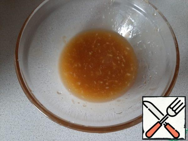 Add the crushed garlic and vegetable oil and mix.